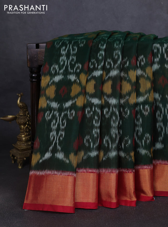 Ikat silk cotton saree bottle green and red with allover ikat weaves and zari woven border