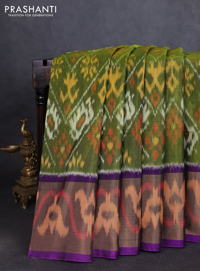 Ikat silk cotton saree mehendi green and violet with allover ikat weaves and long ikat woven zari border
