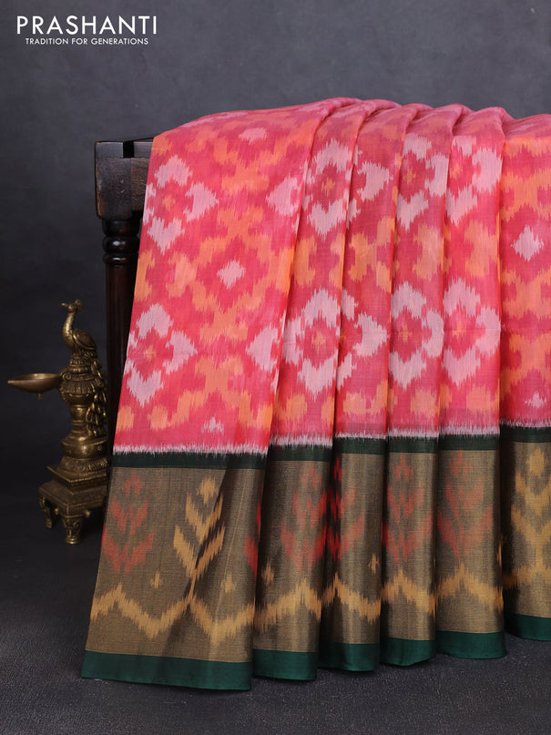 Ikat silk cotton saree peach shade and bottle green with allover ikat weaves and long ikat woven zari border