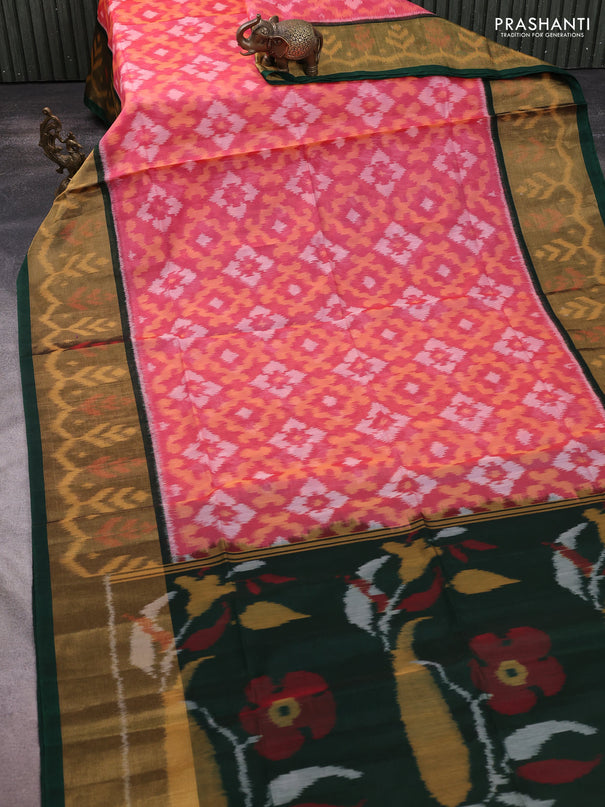Ikat silk cotton saree peach shade and bottle green with allover ikat weaves and long ikat woven zari border
