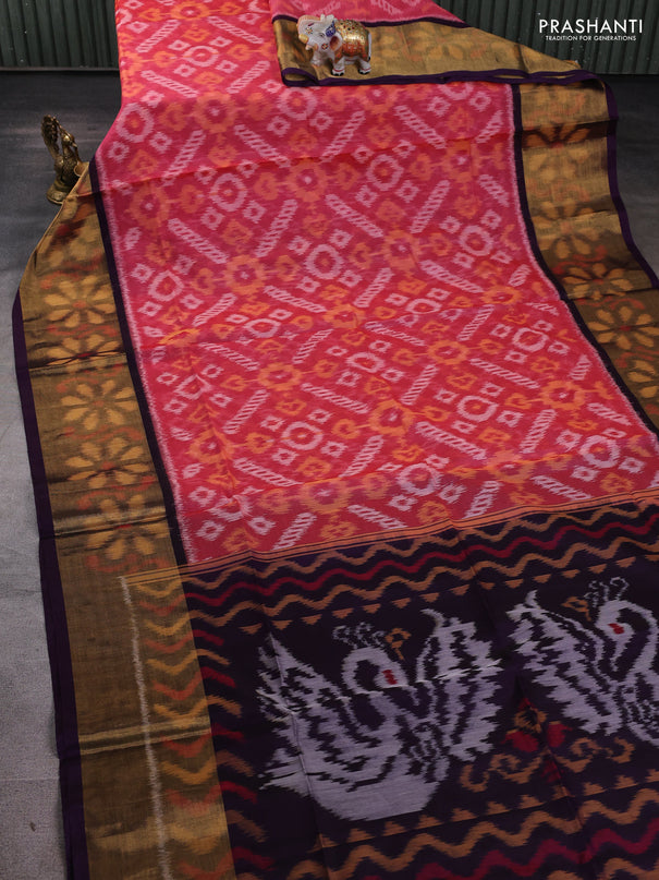 Ikat silk cotton saree peach pink and deep violet with allover ikat weaves and long ikat woven zari border