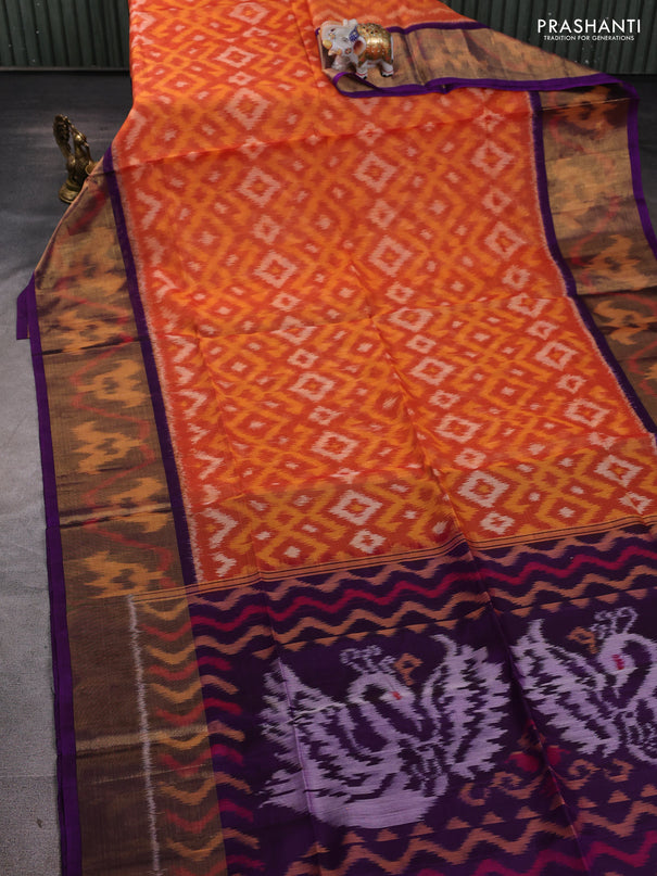 Ikat silk cotton saree orange and purple with allover ikat weaves and long ikat woven zari border