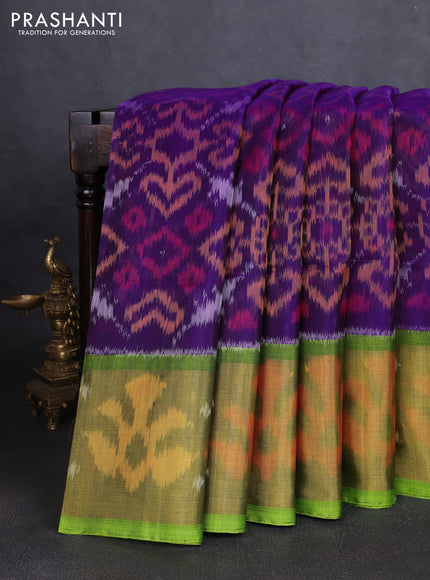 Ikat silk cotton saree deep violet and light green with allover ikat weaves and long ikat woven zari border