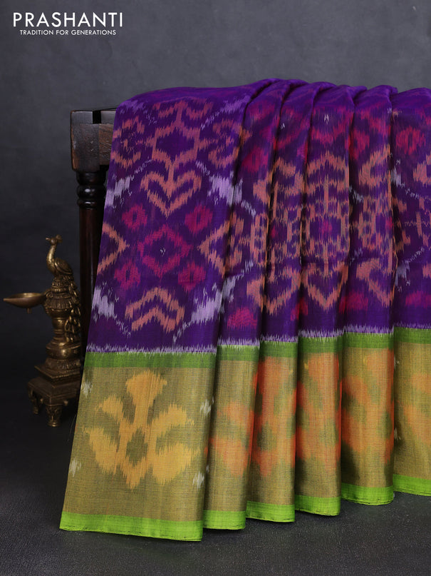 Ikat silk cotton saree deep violet and light green with allover ikat weaves and long ikat woven zari border