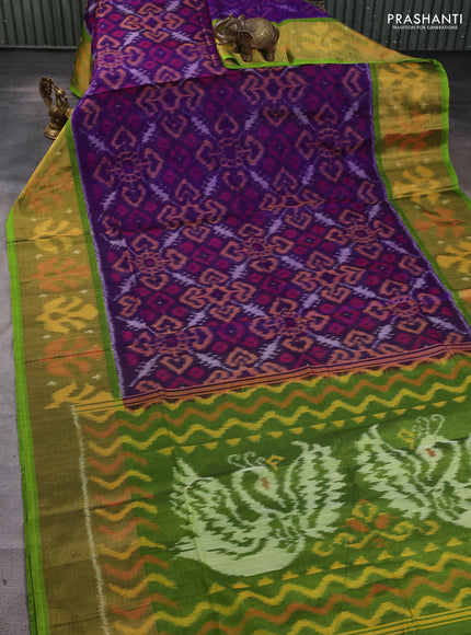 Ikat silk cotton saree deep violet and light green with allover ikat weaves and long ikat woven zari border