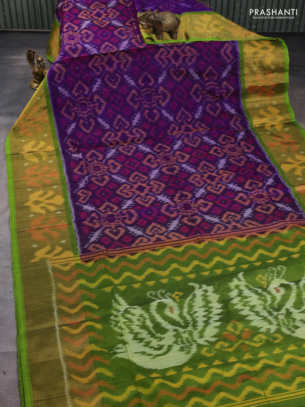 Ikat silk cotton saree deep violet and light green with allover ikat weaves and long ikat woven zari border