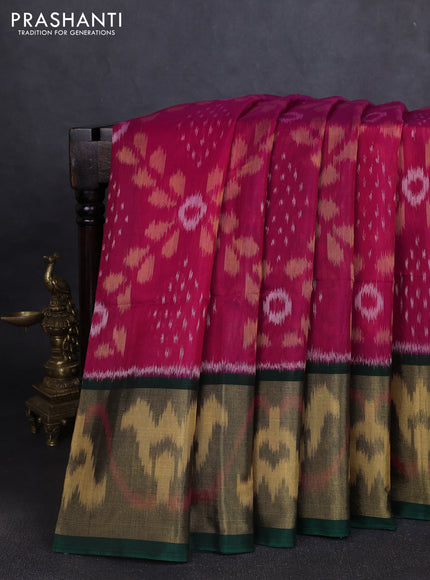 Ikat silk cotton saree dark pink and bottle green with allover ikat weaves and long ikat woven zari border