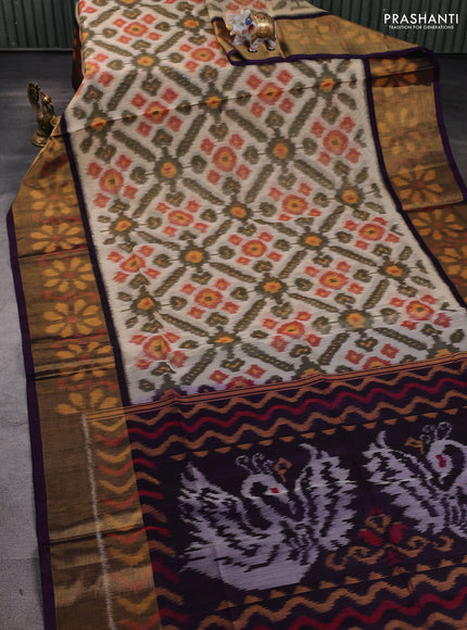 Ikat silk cotton saree peach shade and deep violet with allover ikat weaves and long ikat woven zari border