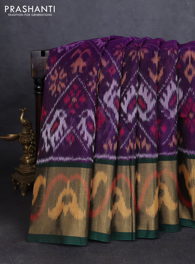 Ikat silk cotton saree deep violet and bottle green with allover ikat weaves and long ikat woven zari border