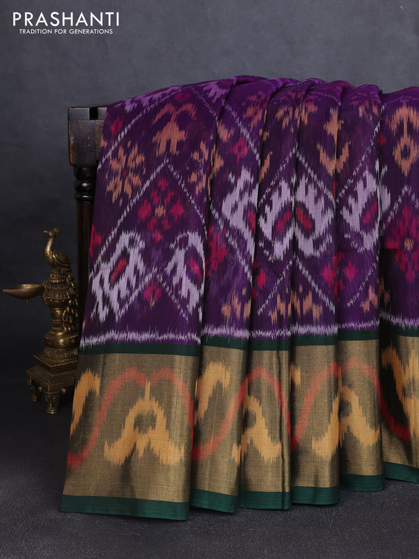 Ikat silk cotton saree deep violet and bottle green with allover ikat weaves and long ikat woven zari border