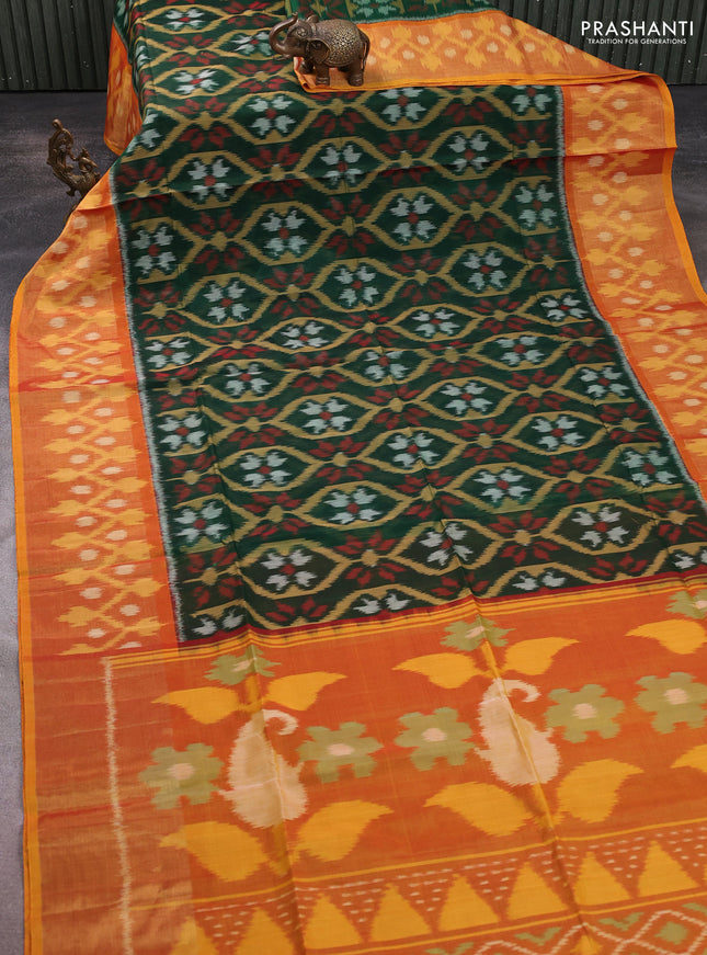 Ikat silk cotton saree bottle green and mustard yellow with allover ikat weaves and long ikat woven zari border