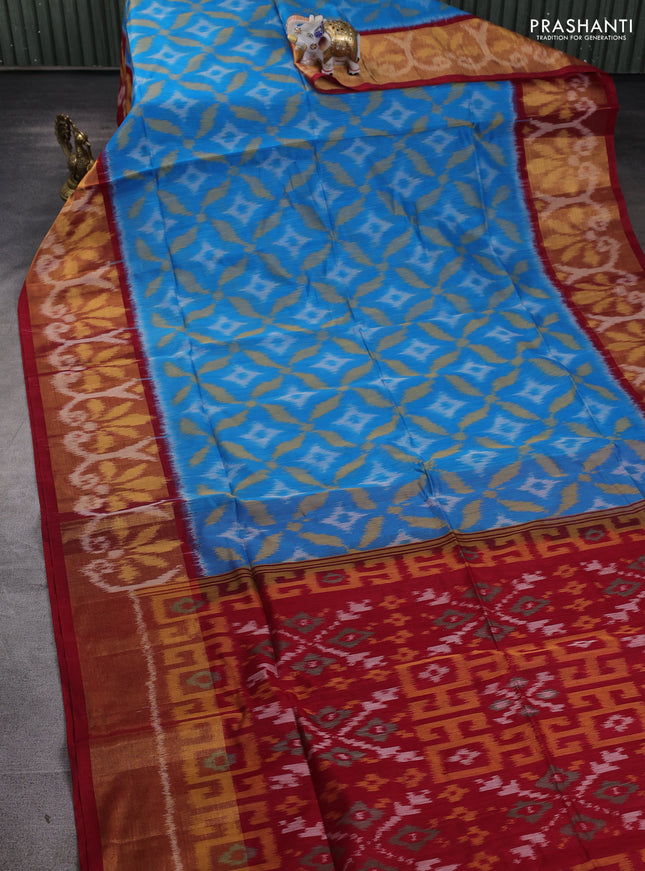 Ikat silk cotton saree cs blue and red with allover ikat weaves and long ikat woven zari border
