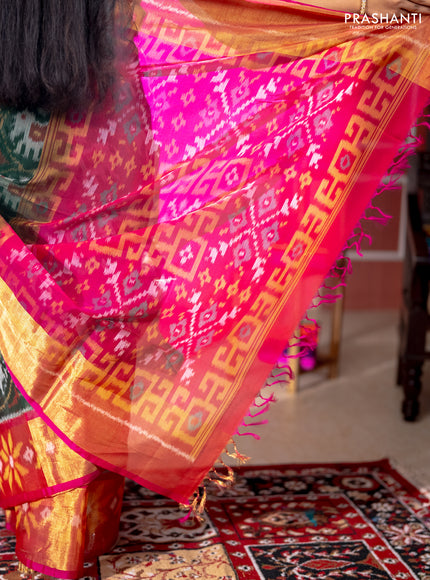 Ikat silk cotton saree bottle green and pink with allover ikat weaves and long ikat woven zari border