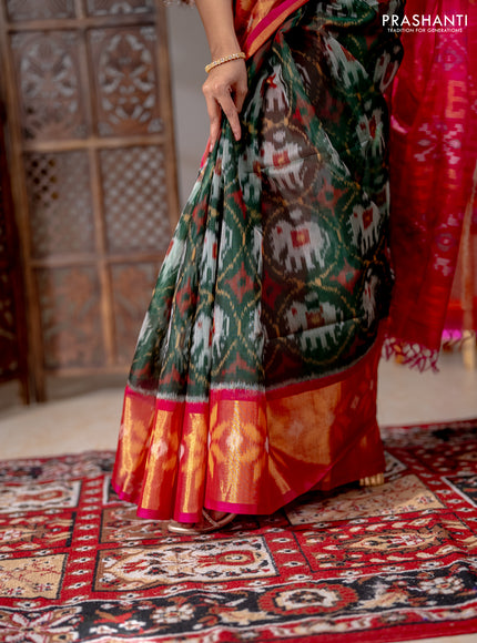 Ikat silk cotton saree bottle green and pink with allover ikat weaves and long ikat woven zari border
