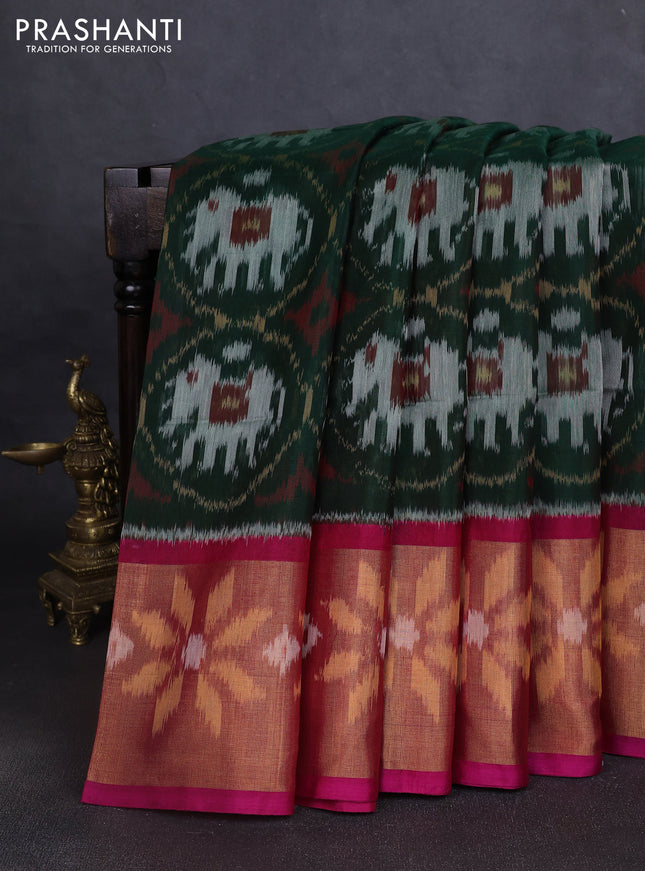 Ikat silk cotton saree bottle green and pink with allover ikat weaves and long ikat woven zari border