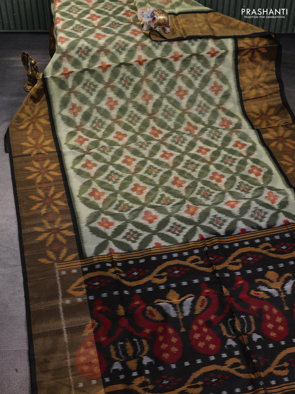 Ikat silk cotton saree olive green and black with allover ikat weaves and long ikat woven zari border