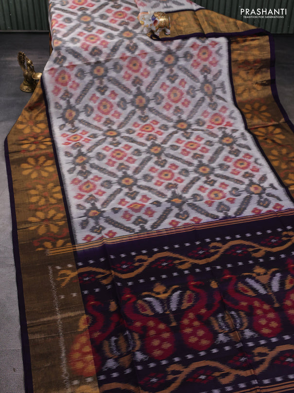 Ikat silk cotton saree off white and violet with allover ikat weaves and long ikat woven zari border