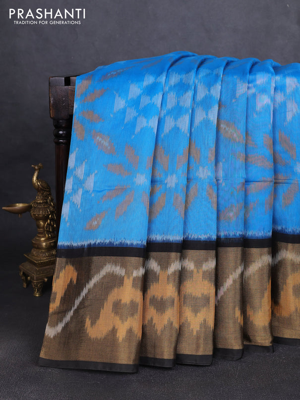 Ikat silk cotton saree teal blue and black with allover ikat weaves and long ikat woven zari border
