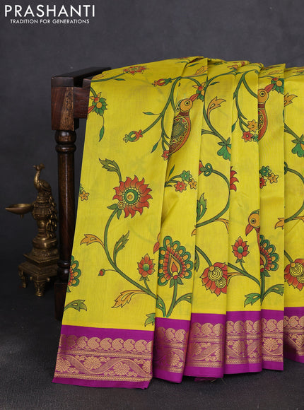 Silk cotton saree yellow and purple with allover kalamkari prints and korvai zari woven border