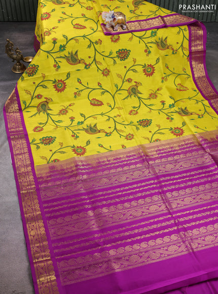 Silk cotton saree yellow and purple with allover kalamkari prints and korvai zari woven border