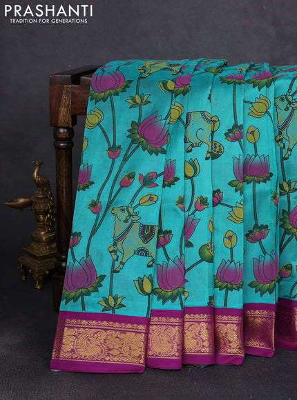 Silk cotton saree teal green and purple with allover pichwai prints and korvai zari woven border