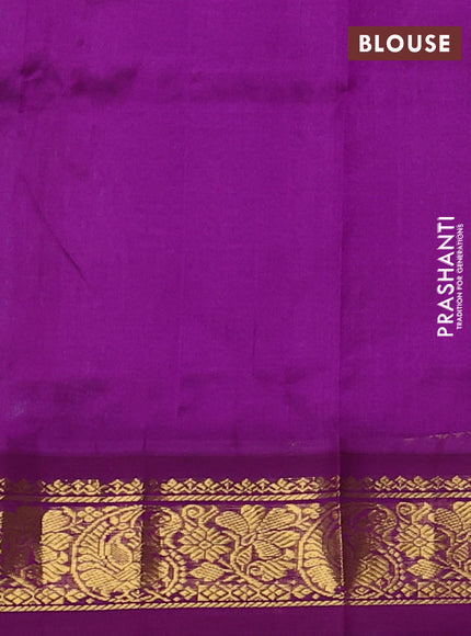 Silk cotton saree teal green and purple with allover pichwai prints and korvai zari woven border