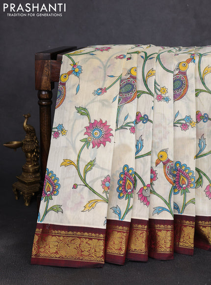Silk cotton saree cream and deep maroon with allover kalamkari prints and korvai zari woven border