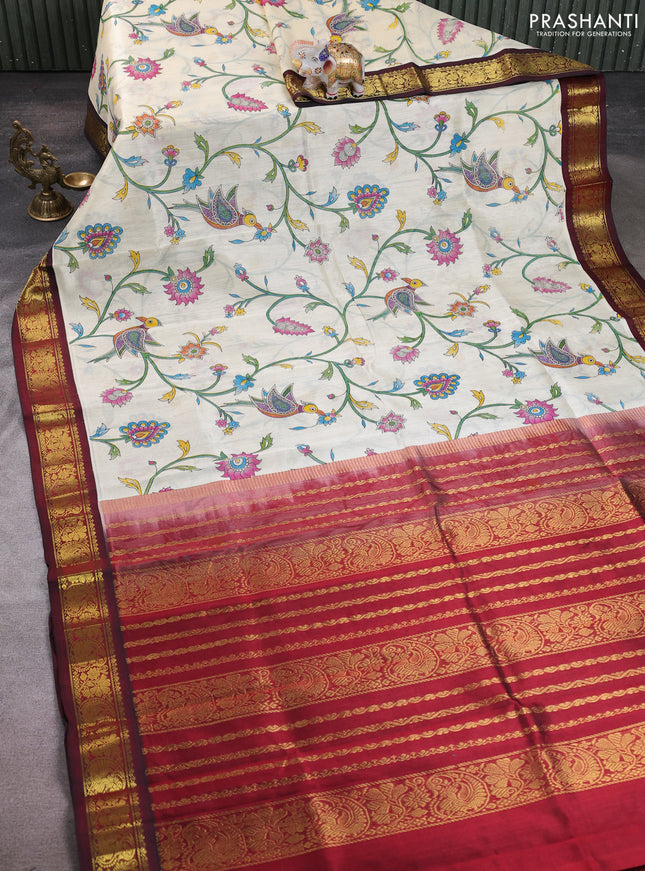 Silk cotton saree cream and deep maroon with allover kalamkari prints and korvai zari woven border