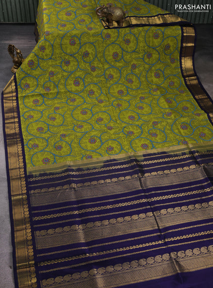 Silk cotton saree light green and navy blue with allover kalamkari prints and korvai zari woven border