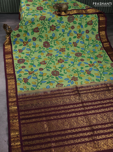 Silk cotton saree pista green and deep maroon with allover kalamkari prints and korvai zari woven border