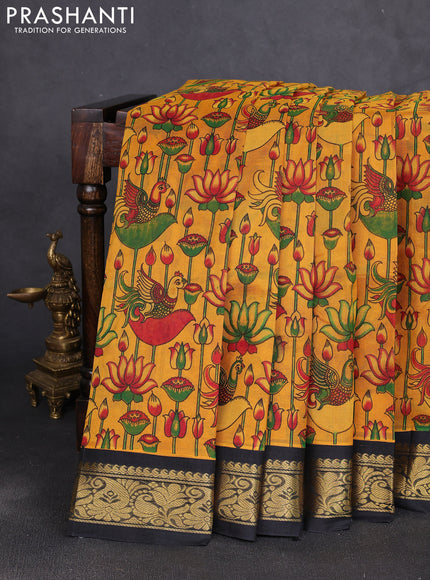 Silk cotton saree mustard yellow and black with allover kalamkari prints and korvai zari woven border