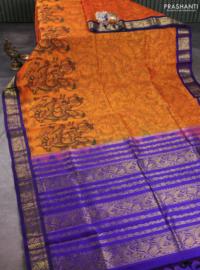 Silk cotton saree orange and dark blue with allover kalamkari prints and korvai zari woven border