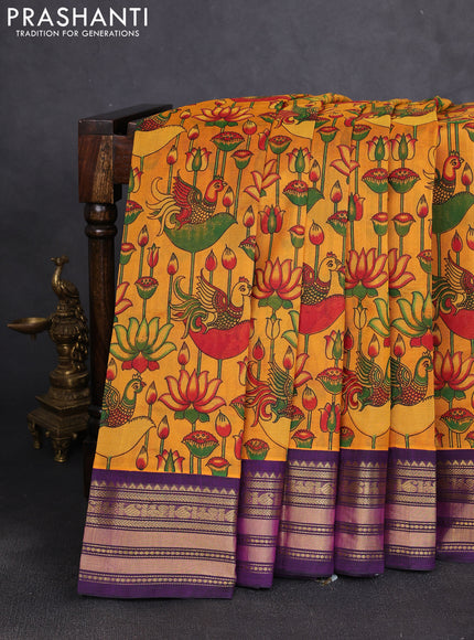 Silk cotton saree mustard yellow and purple with allover kalamkari prints and korvai zari woven border