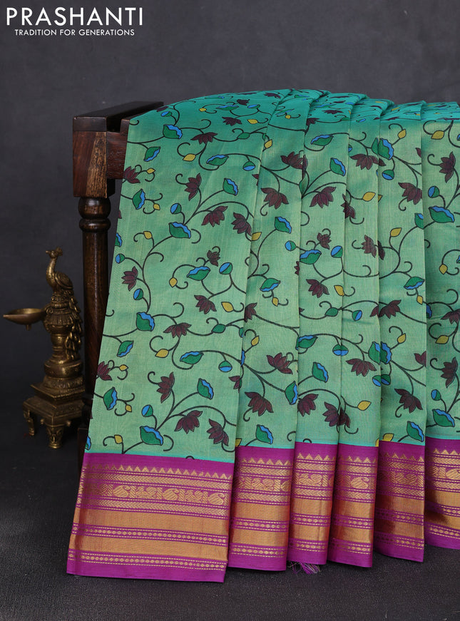 Silk cotton saree teal green and purple with allover kalamkari prints and korvai zari woven border