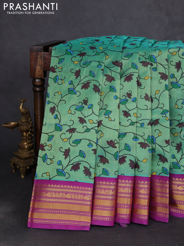 Silk cotton saree teal green and purple with allover kalamkari prints and korvai zari woven border