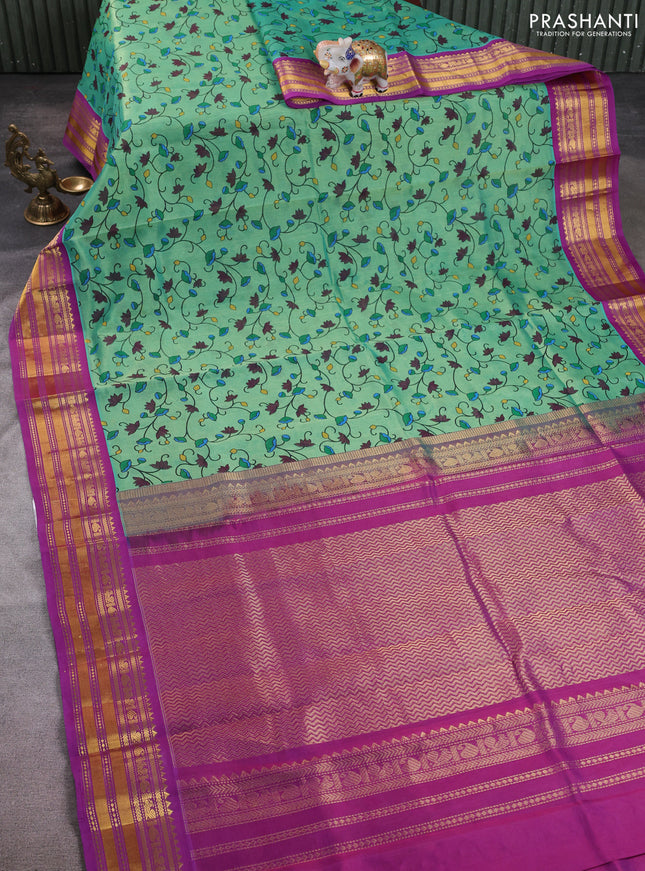 Silk cotton saree teal green and purple with allover kalamkari prints and korvai zari woven border