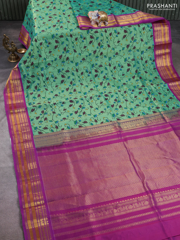 Silk cotton saree teal green and purple with allover kalamkari prints and korvai zari woven border