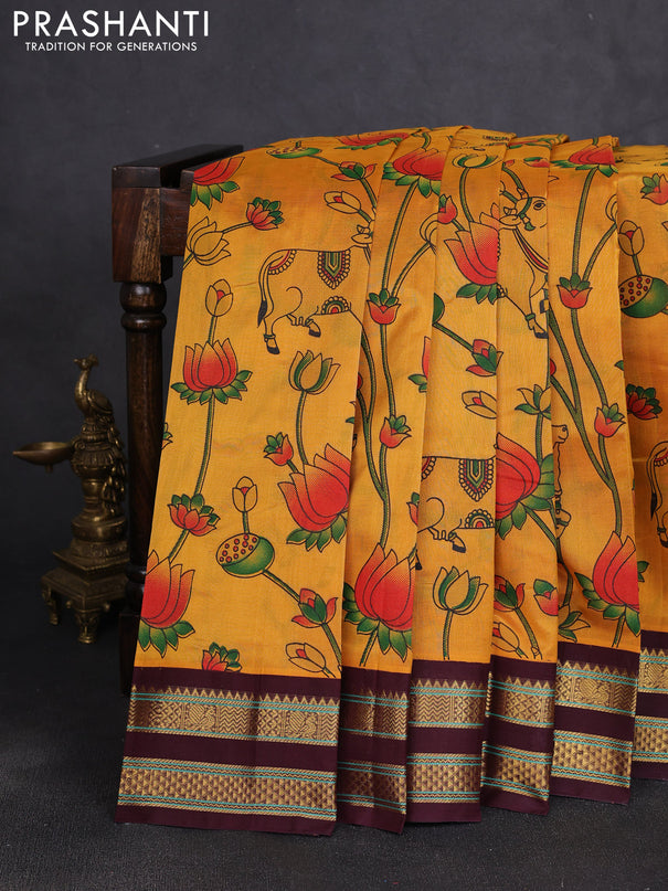 Silk cotton saree mustard yellow and coffee brown with allover pichwai prints and korvai zari woven border
