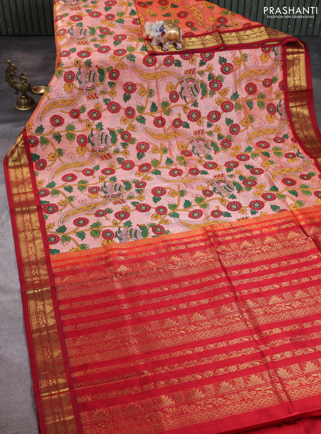 Silk cotton saree peach orange and red with allover kalamkari prints and korvai zari woven border