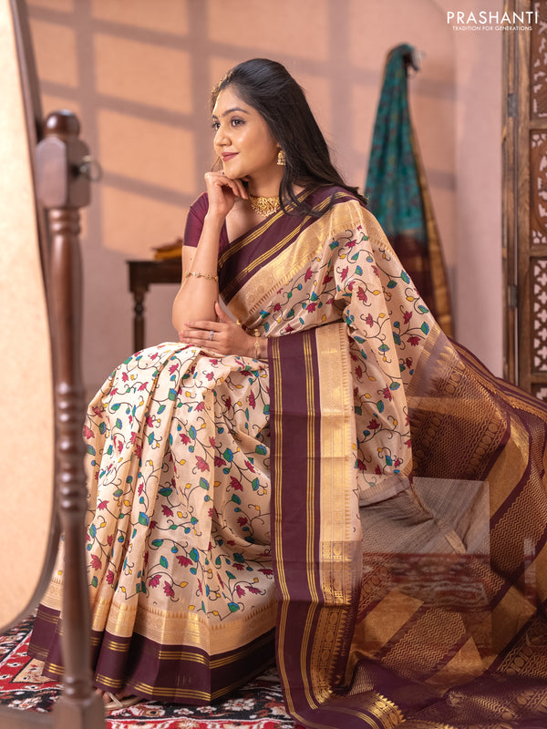 Silk cotton saree beige and coffee brown with allover kalamkari prints and korvai zari woven border