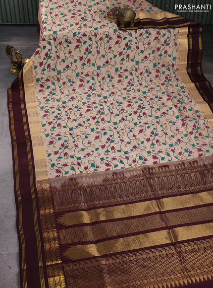 Silk cotton saree beige and coffee brown with allover kalamkari prints and korvai zari woven border
