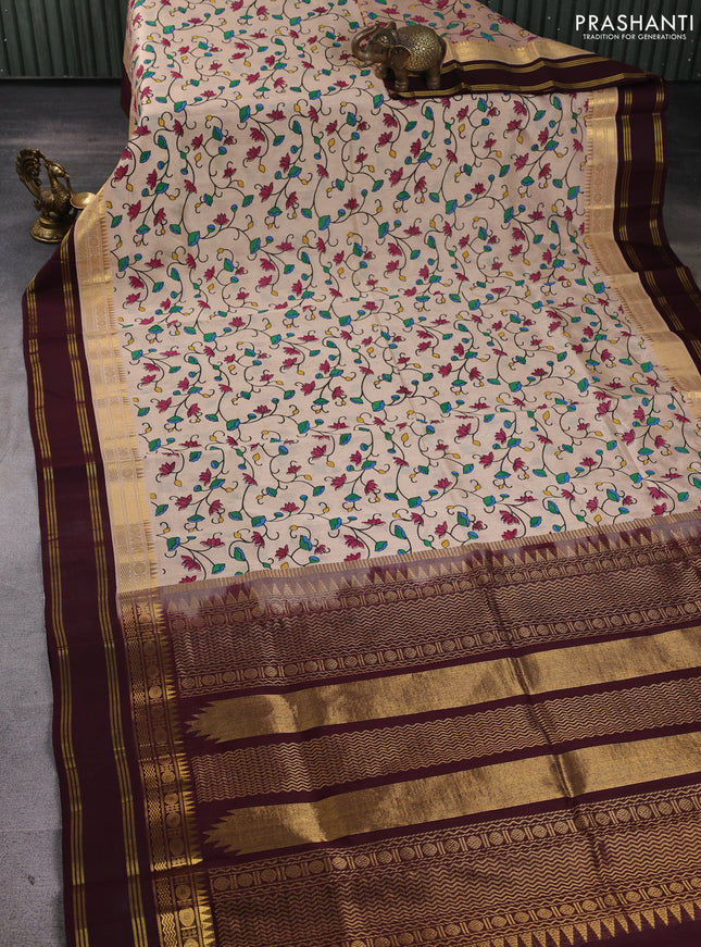 Silk cotton saree beige and coffee brown with allover kalamkari prints and korvai zari woven border