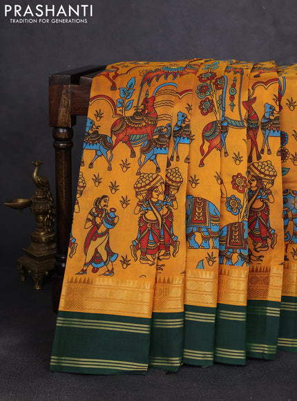 Silk cotton saree mustard yellow and bottle green with allover kalamkari prints and korvai zari woven border