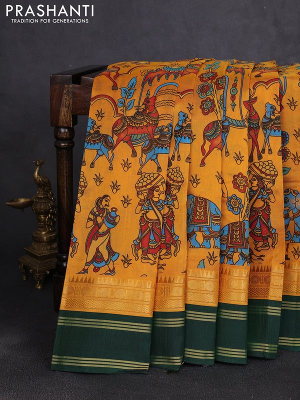 Silk cotton saree mustard yellow and bottle green with allover kalamkari prints and korvai zari woven border