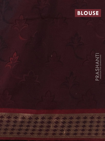 Kora silk cotton saree bottle green and deep wine with allover self emboss and zari woven border