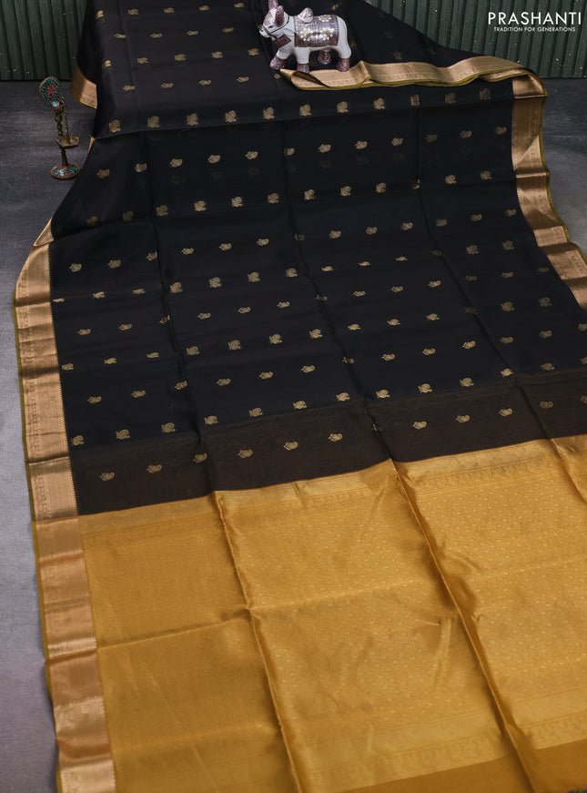 Kora silk cotton saree black and dark mustard with paisley & annam zari woven buttas and zari woven border