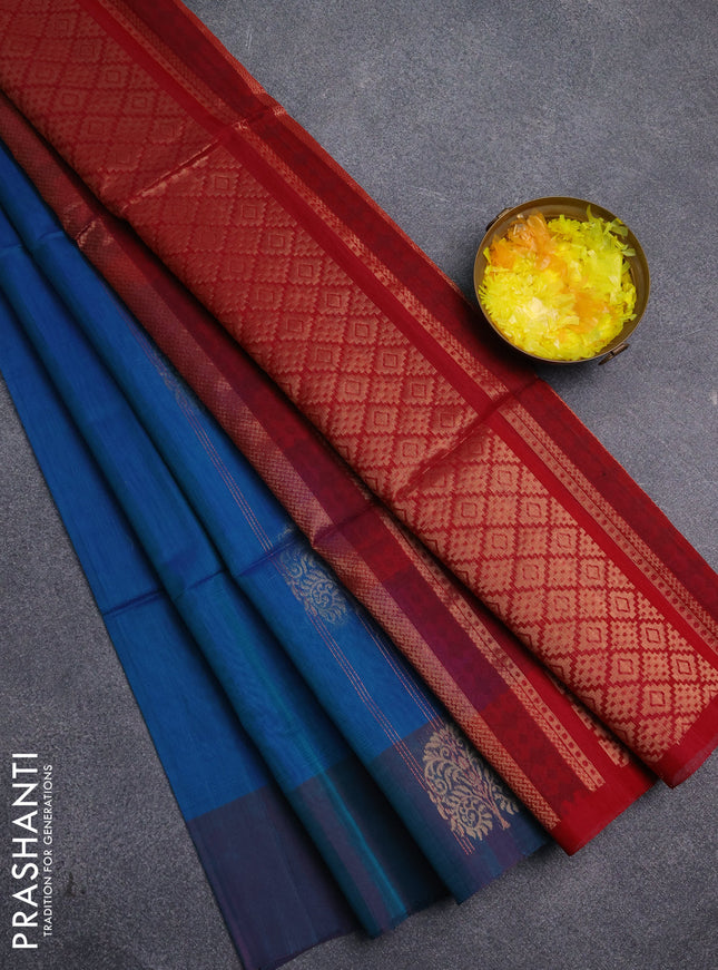 Kora silk cotton saree dual shade of bluish green and reddish pink with allover zari weaves & buttas and zari woven butta border