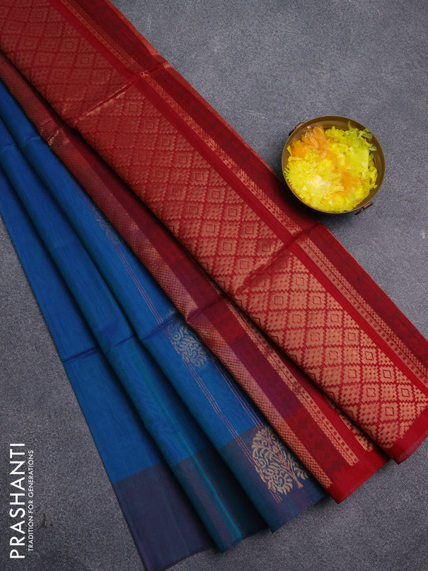Kora silk cotton saree dual shade of bluish green and reddish pink with allover zari weaves & buttas and zari woven butta border