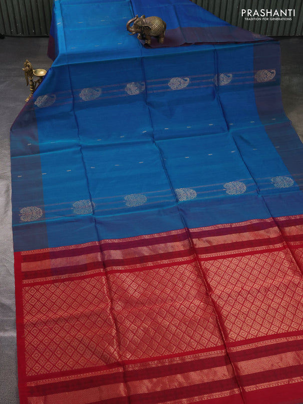 Kora silk cotton saree dual shade of bluish green and reddish pink with allover zari weaves & buttas and zari woven butta border