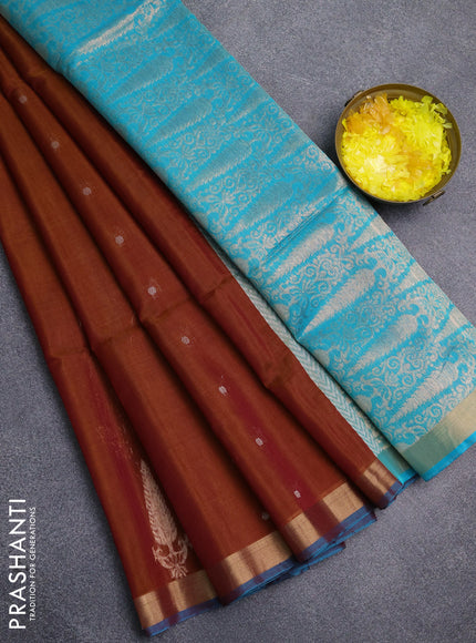 Kora silk cotton saree honey shade and teal blue with allover silver zari woven buttas and zari woven border